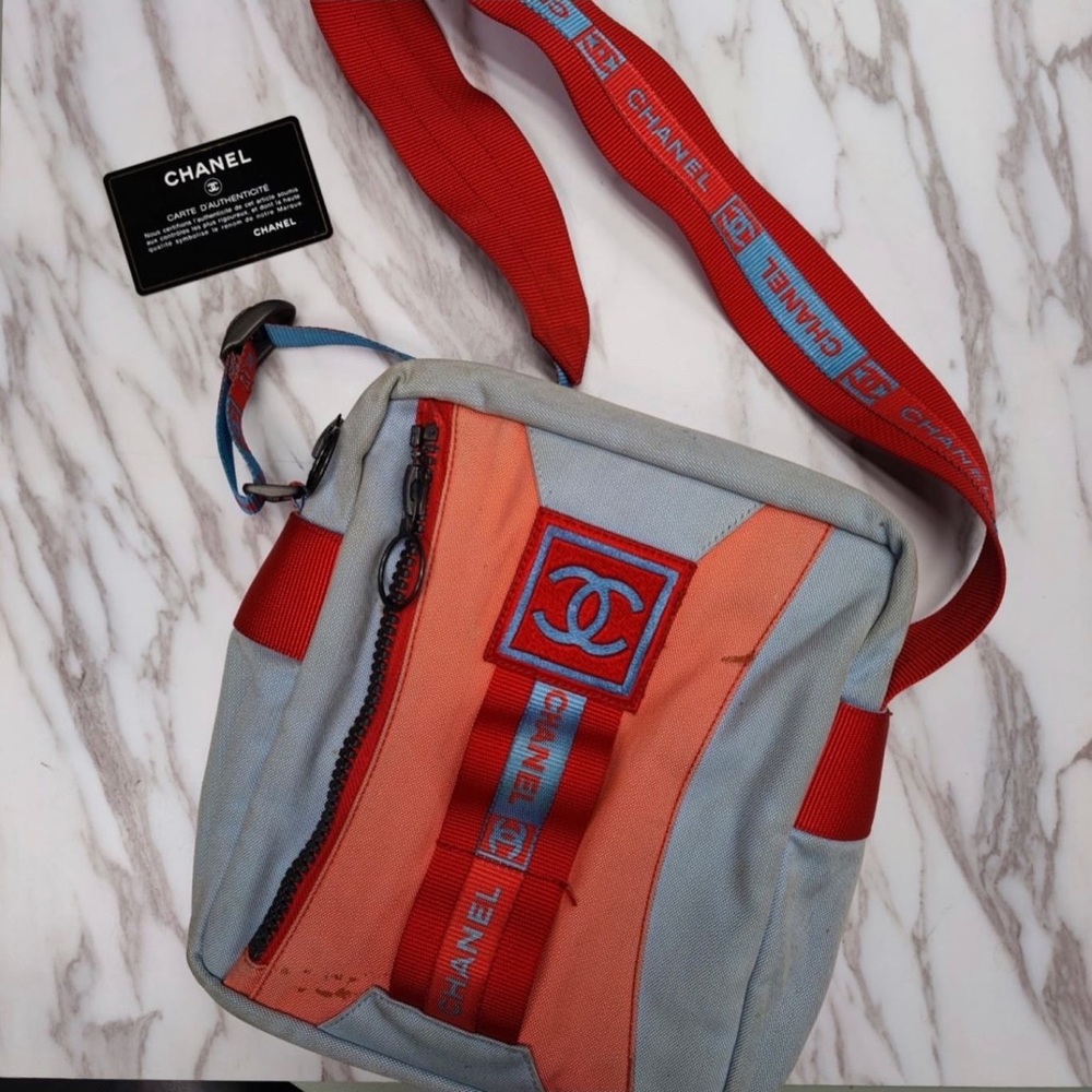 Vintage nylon Chanel travel line shoulder bag with red, fair condition